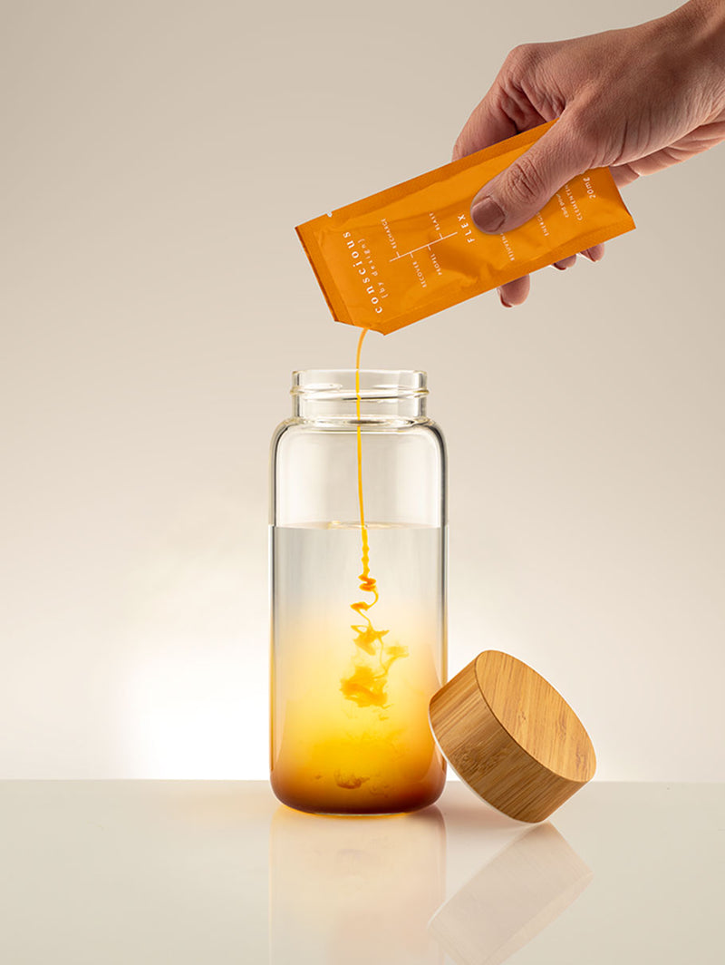 FLEX wellness pour with clemetine, orange, ginger, turmeric, curcumin, vitamin B12 and swiss-grade CBD